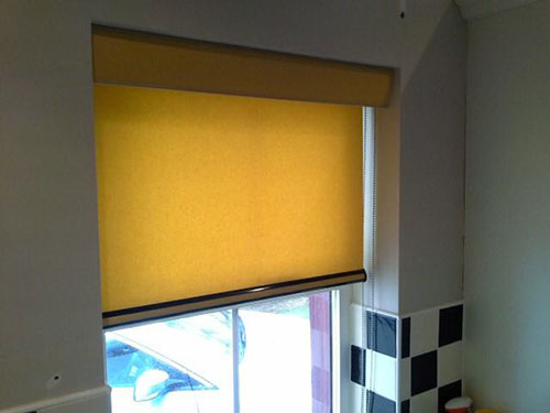 canary-yellow-blind-with-black-metal-bottom-bar-and-matching-pelmet-hides-all-the-brackets-and-screws_zpsffec5a01